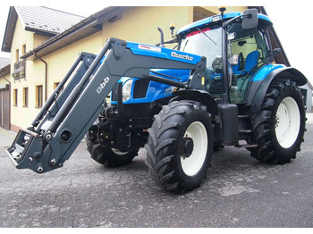 리스  Ciągnik New Holland NH TS125A 6 cylindrów 2004 Ciągnik rolniczy New Holland TS125A Ciągnik New Holland NH TS125A 6 cylindrów 2004 Ciągnik rolniczy New Holland TS125A : 사진 1