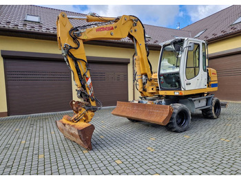 휠 굴삭기 LIEBHERR A 311