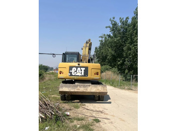 휠 굴삭기 CATERPILLAR