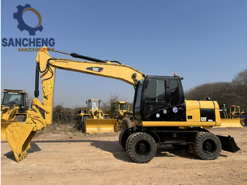 휠 굴삭기 CATERPILLAR M320