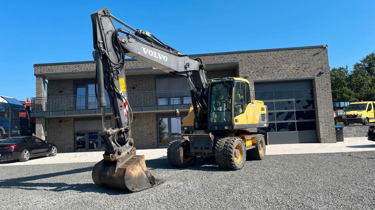 Volvo EW180D 20500 Kg Verstellausleger OilQuick - 휠 굴삭기 : 사진 1 Volvo EW180D 20500 Kg Verstellausleger OilQuick - 휠 굴삭기 : 사진 1