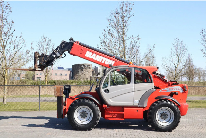 Manitou MT 1440 EASY | AIRCO | HYDR. FORKS - 텔레스코픽 핸들러 : 사진 1 Manitou MT 1440 EASY | AIRCO | HYDR. FORKS - 텔레스코픽 핸들러 : 사진 1