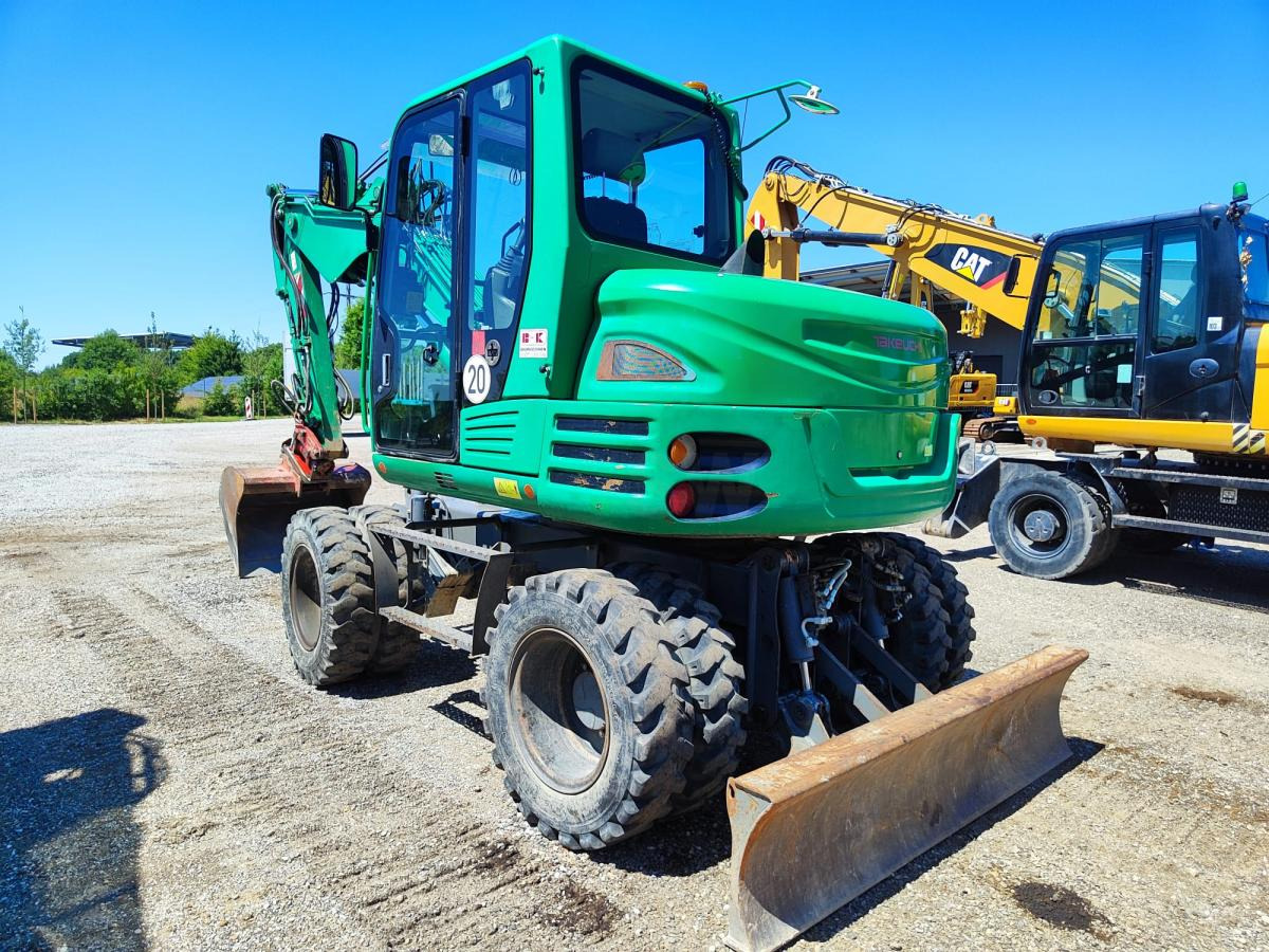 Takeuchi TB295W - 휠 굴삭기 : 사진 1 Takeuchi TB295W - 휠 굴삭기 : 사진 1