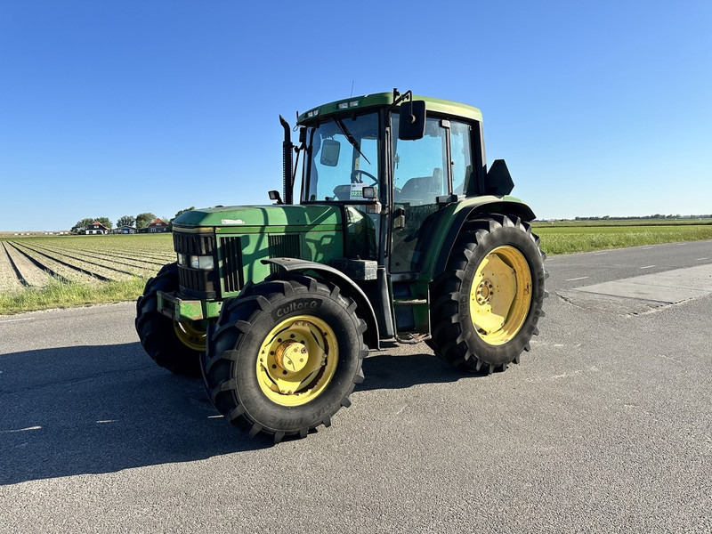 John Deere 6400 - 장궤형 트랙터 : 사진 1 John Deere 6400 - 장궤형 트랙터 : 사진 1