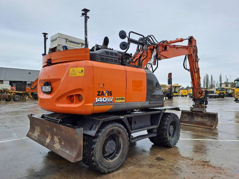 Hitachi ZX140WTB-6 (Topcon GPS + Engcon) - 휠 굴삭기 : 사진 4 Hitachi ZX140WTB-6 (Topcon GPS + Engcon) - 휠 굴삭기 : 사진 4