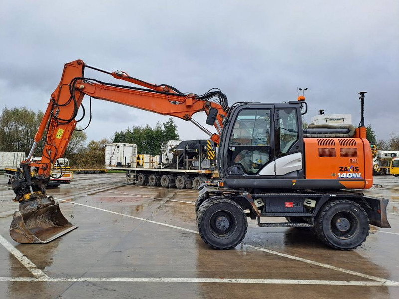 Hitachi ZX140WTB-6 (Topcon GPS + Engcon) - 휠 굴삭기 : 사진 1 Hitachi ZX140WTB-6 (Topcon GPS + Engcon) - 휠 굴삭기 : 사진 1