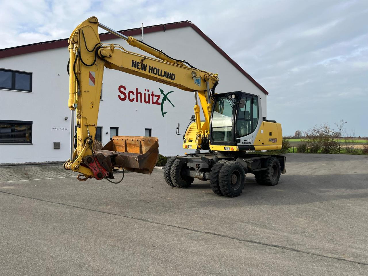 New Holland MH 5.6 inkl. Grabenlöffel, Tieflöffel - 휠 굴삭기 : 사진 1 New Holland MH 5.6 inkl. Grabenlöffel, Tieflöffel - 휠 굴삭기 : 사진 1