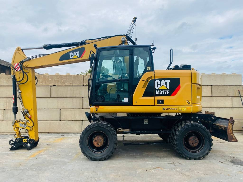 CAT m317f - 휠 굴삭기 : 사진 1 CAT m317f - 휠 굴삭기 : 사진 1