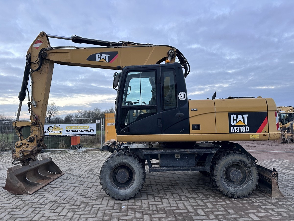 CATERPILLAR M 318 D full Hydr. Top Zustand German machine ! - 휠 굴삭기 : 사진 1 CATERPILLAR M 318 D full Hydr. Top Zustand German machine ! - 휠 굴삭기 : 사진 1