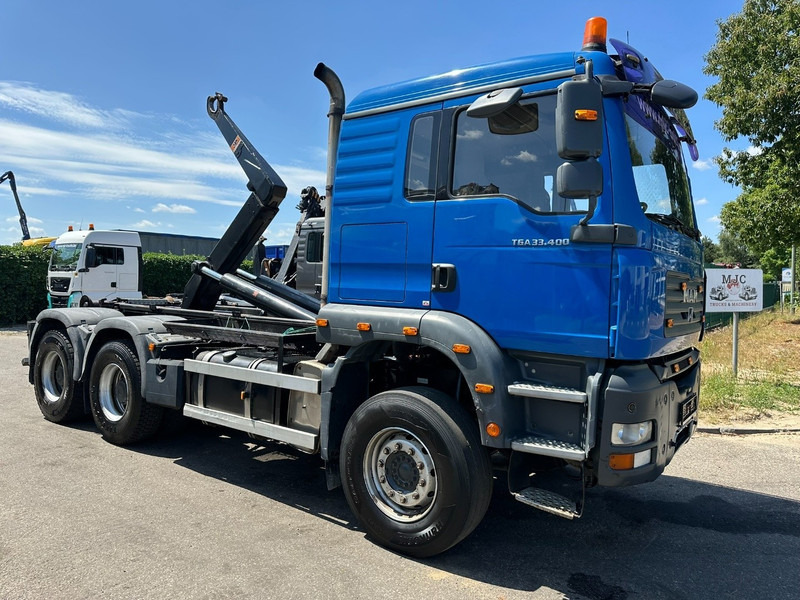 MAN TGA 33.400 6X4 HOOKLIFT AJK NHS20-4930mm - WB 3m60 - MANUAL ZF - STEEL SPRING / BLATT - BIG AXLES / AP ACHSEN - 후크 리프트 트럭 : 사진 1 MAN TGA 33.400 6X4 HOOKLIFT AJK NHS20-4930mm - WB 3m60 - MANUAL ZF - STEEL SPRING / BLATT - BIG AXLES / AP ACHSEN - 후크 리프트 트럭 : 사진 1