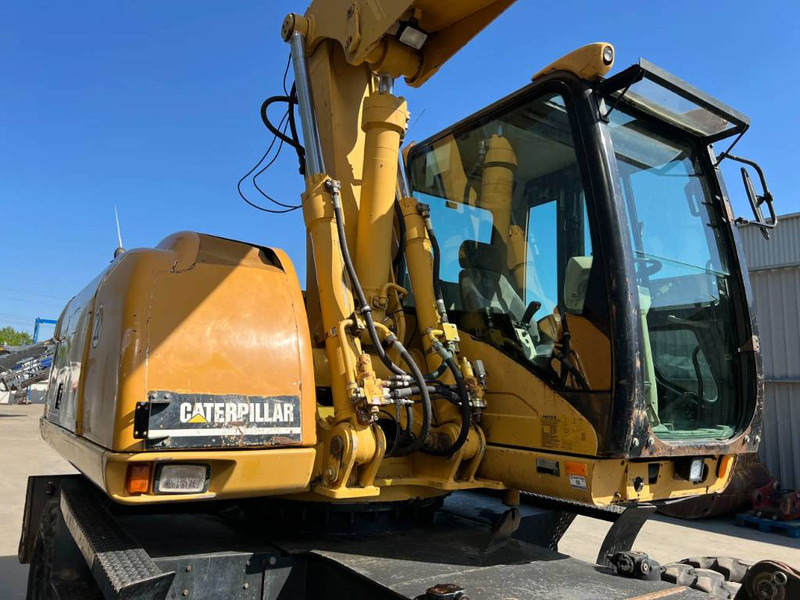 휠 굴삭기 Cat M316C : 사진 12