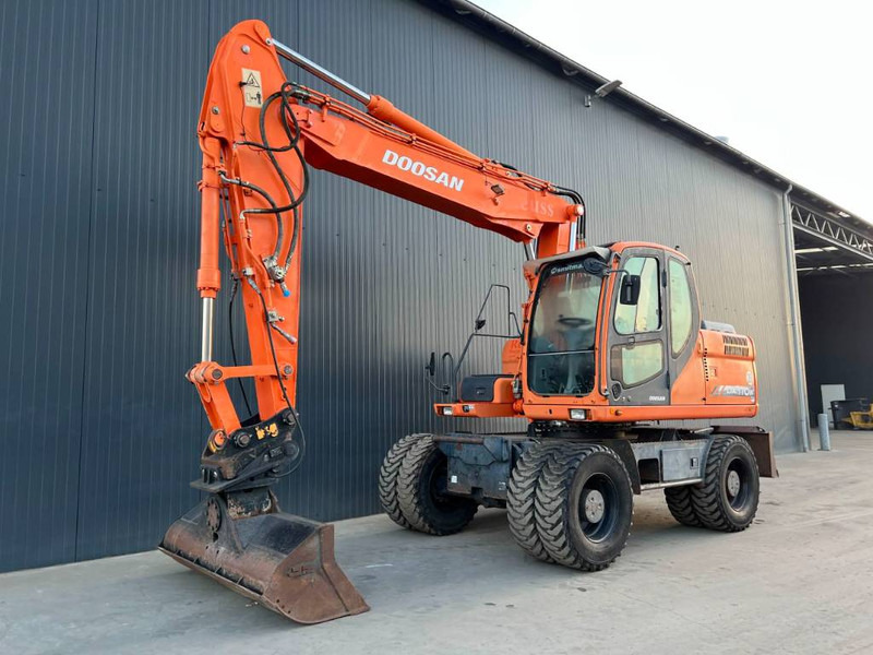 Doosan DX170W - 휠 굴삭기 : 사진 1 Doosan DX170W - 휠 굴삭기 : 사진 1