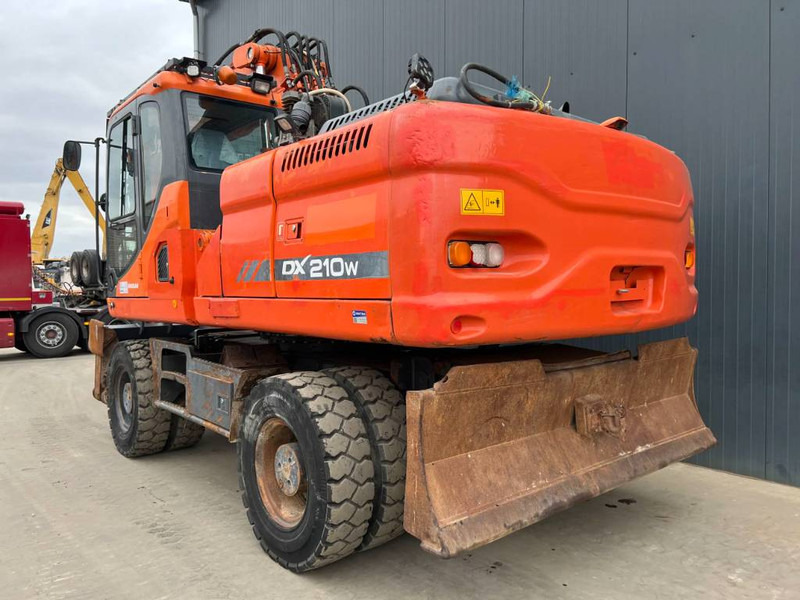Doosan DX210W - 휠 굴삭기 : 사진 2 Doosan DX210W - 휠 굴삭기 : 사진 2