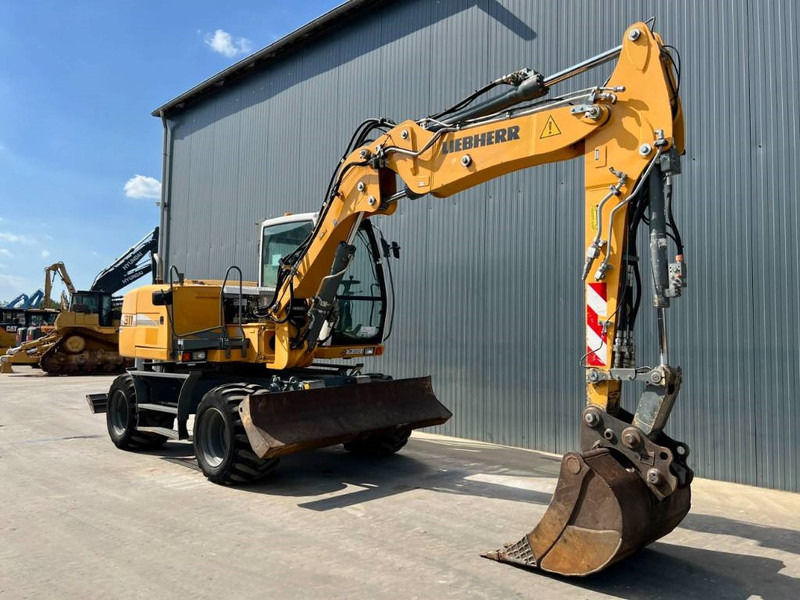 Liebherr A311 Litronic - 휠 굴삭기 : 사진 3 Liebherr A311 Litronic - 휠 굴삭기 : 사진 3