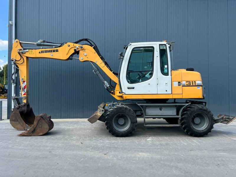 Liebherr A311 Litronic - 휠 굴삭기 : 사진 5 Liebherr A311 Litronic - 휠 굴삭기 : 사진 5