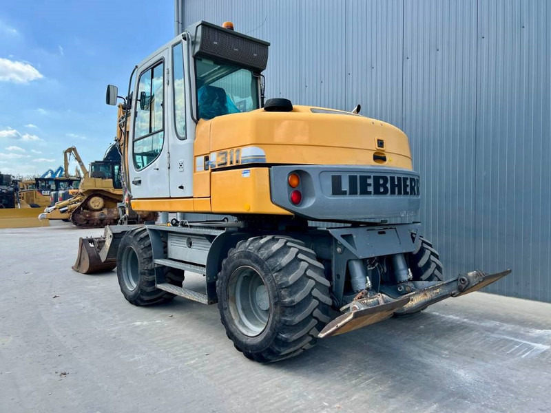 Liebherr A311 Litronic - 휠 굴삭기 : 사진 2 Liebherr A311 Litronic - 휠 굴삭기 : 사진 2