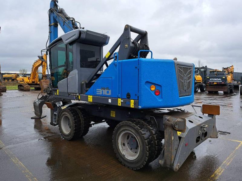 Fuchs MHL310F + Grapple - 폐기물/ 산업 처리기 : 사진 5 Fuchs MHL310F + Grapple - 폐기물/ 산업 처리기 : 사진 5