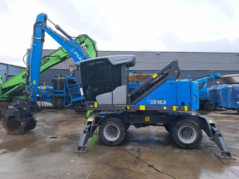 Fuchs MHL310F + Grapple - 폐기물/ 산업 처리기 : 사진 4 Fuchs MHL310F + Grapple - 폐기물/ 산업 처리기 : 사진 4