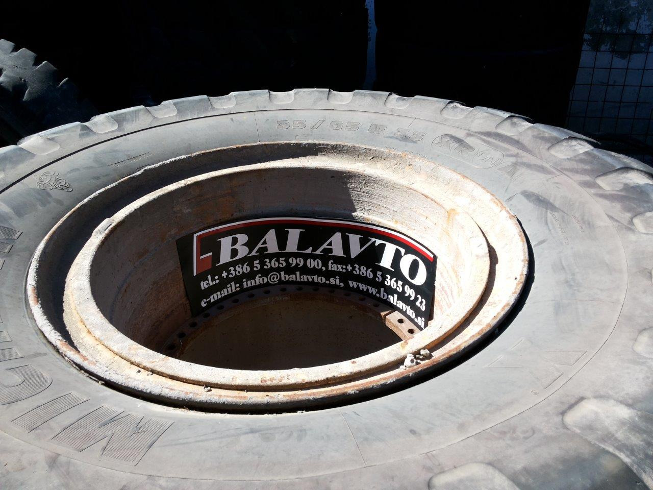 Caterpillar 988B - 휠 및 타이어 패키지 건설기계 용 : 사진 1 Caterpillar 988B - 휠 및 타이어 패키지 건설기계 용 : 사진 1