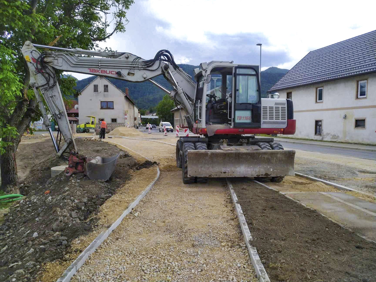 Takeuchi TB1160W - 휠 굴삭기 : 사진 1 Takeuchi TB1160W - 휠 굴삭기 : 사진 1
