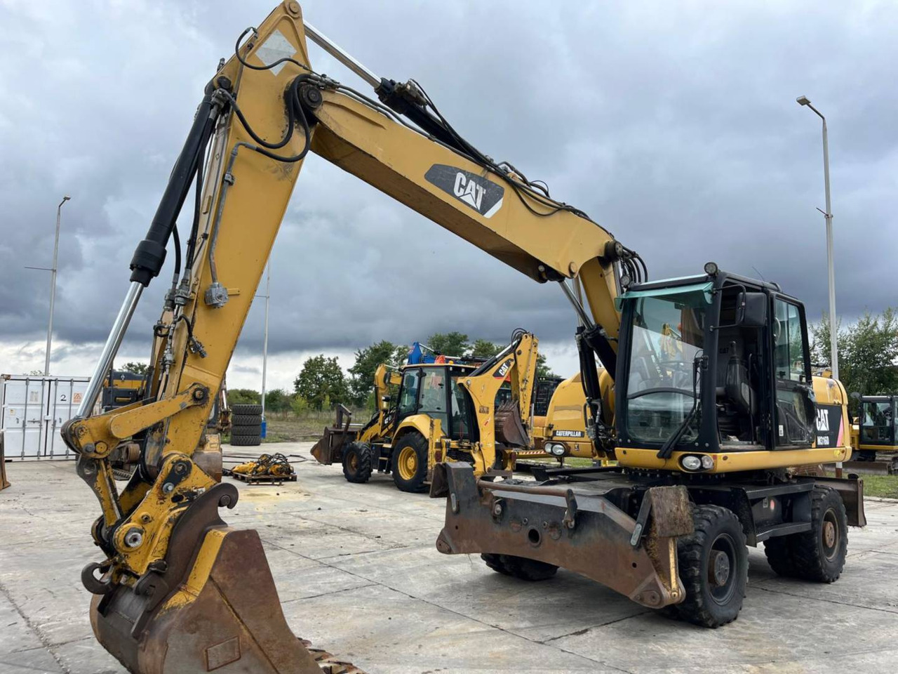 CAT M316D - 휠 굴삭기 : 사진 1 CAT M316D - 휠 굴삭기 : 사진 1