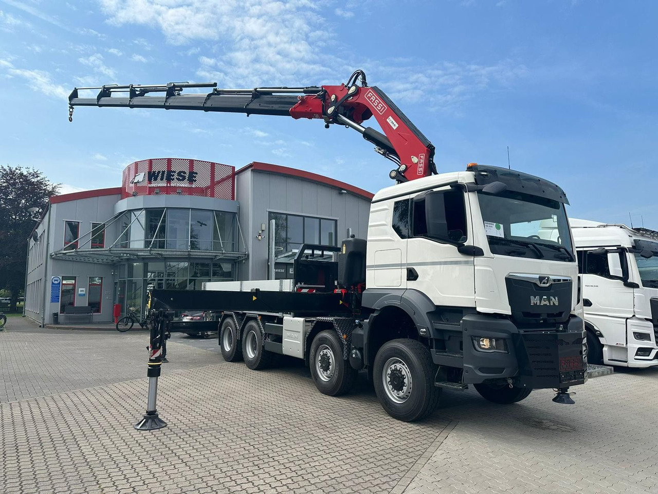 MAN TGS 41.520 8x8 mit Fassi Ladekran F710RA.2.26 - 드롭사이드/ 플랫베드 트럭 : 사진 1 MAN TGS 41.520 8x8 mit Fassi Ladekran F710RA.2.26 - 드롭사이드/ 플랫베드 트럭 : 사진 1