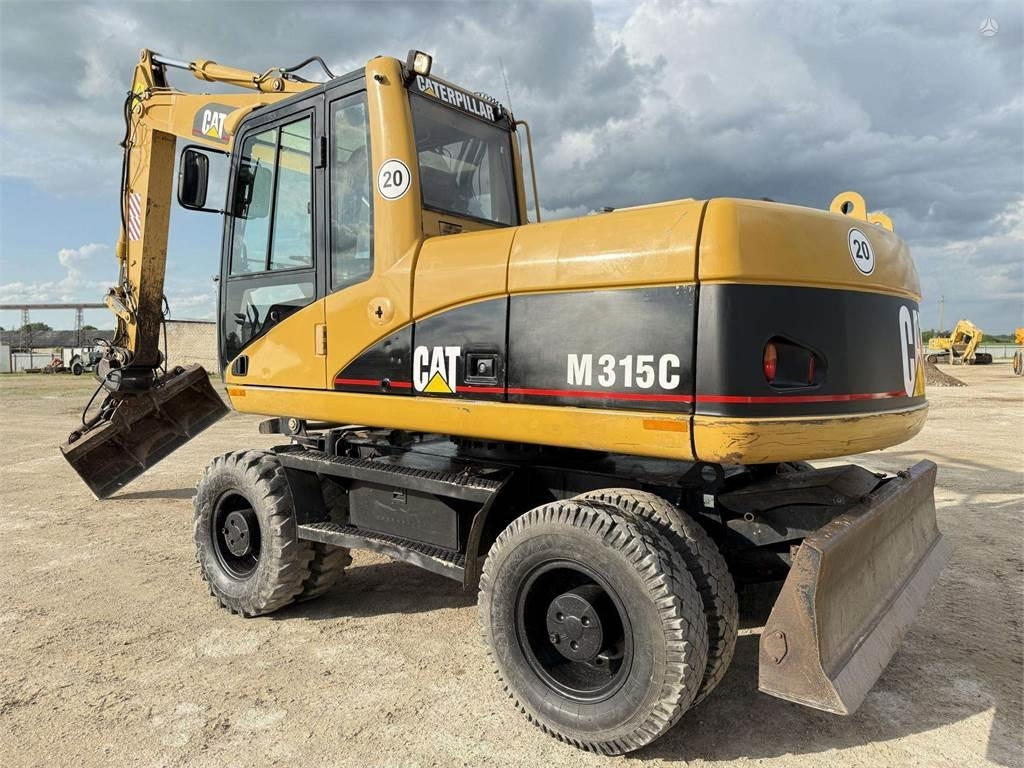 CAT M315C - 휠 굴삭기 : 사진 1 CAT M315C - 휠 굴삭기 : 사진 1