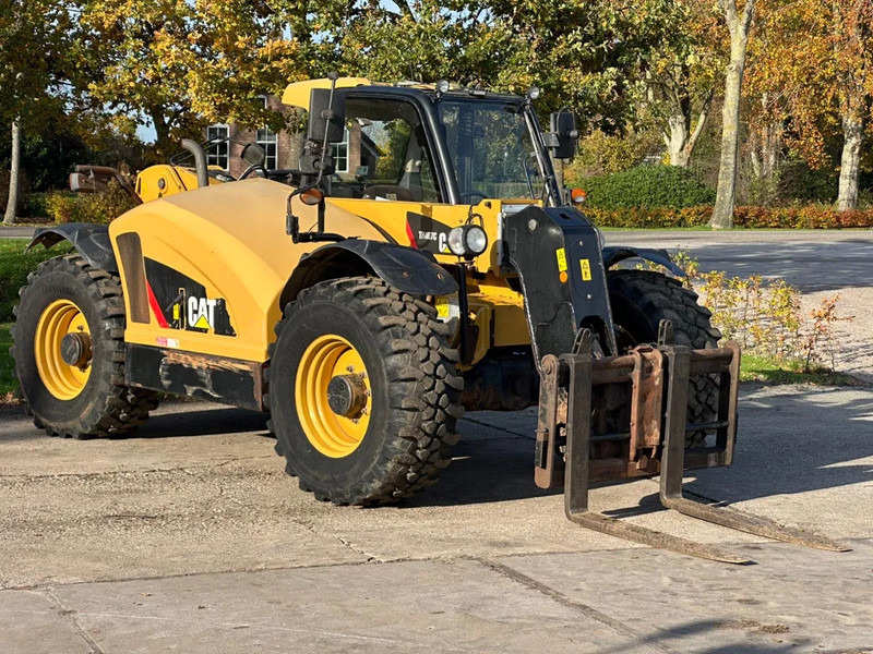 농업용 기계 Caterpillar TH 407 verreiker : 사진 1