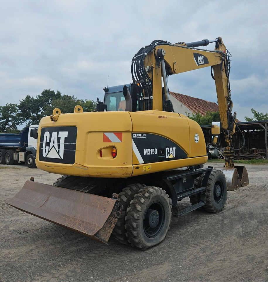 CAT M315D orig. 4.129h - 휠 굴삭기 : 사진 2 CAT M315D orig. 4.129h - 휠 굴삭기 : 사진 2