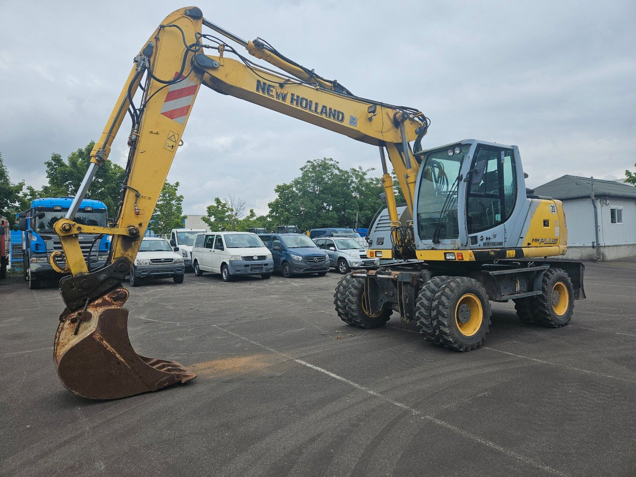 New Holland MH Plus 18t Mobilbagger - 휠 굴삭기 : 사진 1 New Holland MH Plus 18t Mobilbagger - 휠 굴삭기 : 사진 1
