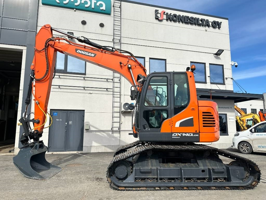 Doosan DX 140 LCR-5 metsäalusta - 크롤러 굴삭기 : 사진 1 Doosan DX 140 LCR-5 metsäalusta - 크롤러 굴삭기 : 사진 1