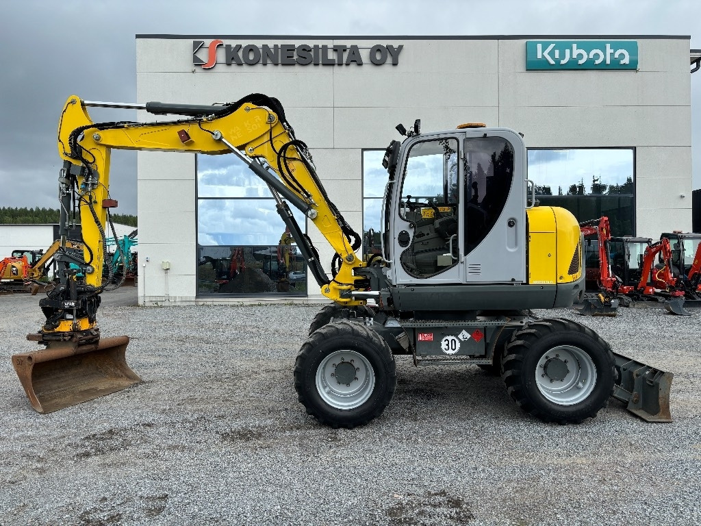 Wacker Neuson EW 100 - 휠 굴삭기 : 사진 1 Wacker Neuson EW 100 - 휠 굴삭기 : 사진 1