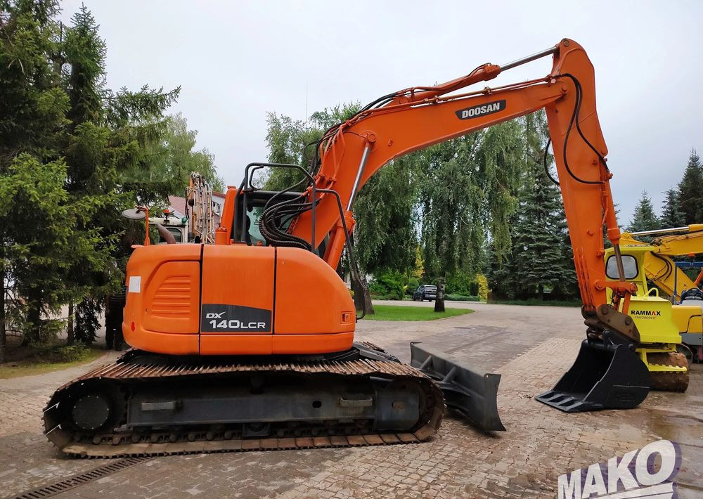 Doosan DX140LCR - 크롤러 굴삭기 : 사진 5 Doosan DX140LCR - 크롤러 굴삭기 : 사진 5