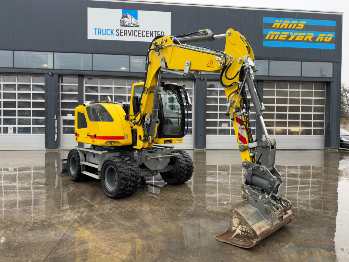 LIEBHERR 910 Compact Litronic Powertilt - 휠 굴삭기 : 사진 2 LIEBHERR 910 Compact Litronic Powertilt - 휠 굴삭기 : 사진 2