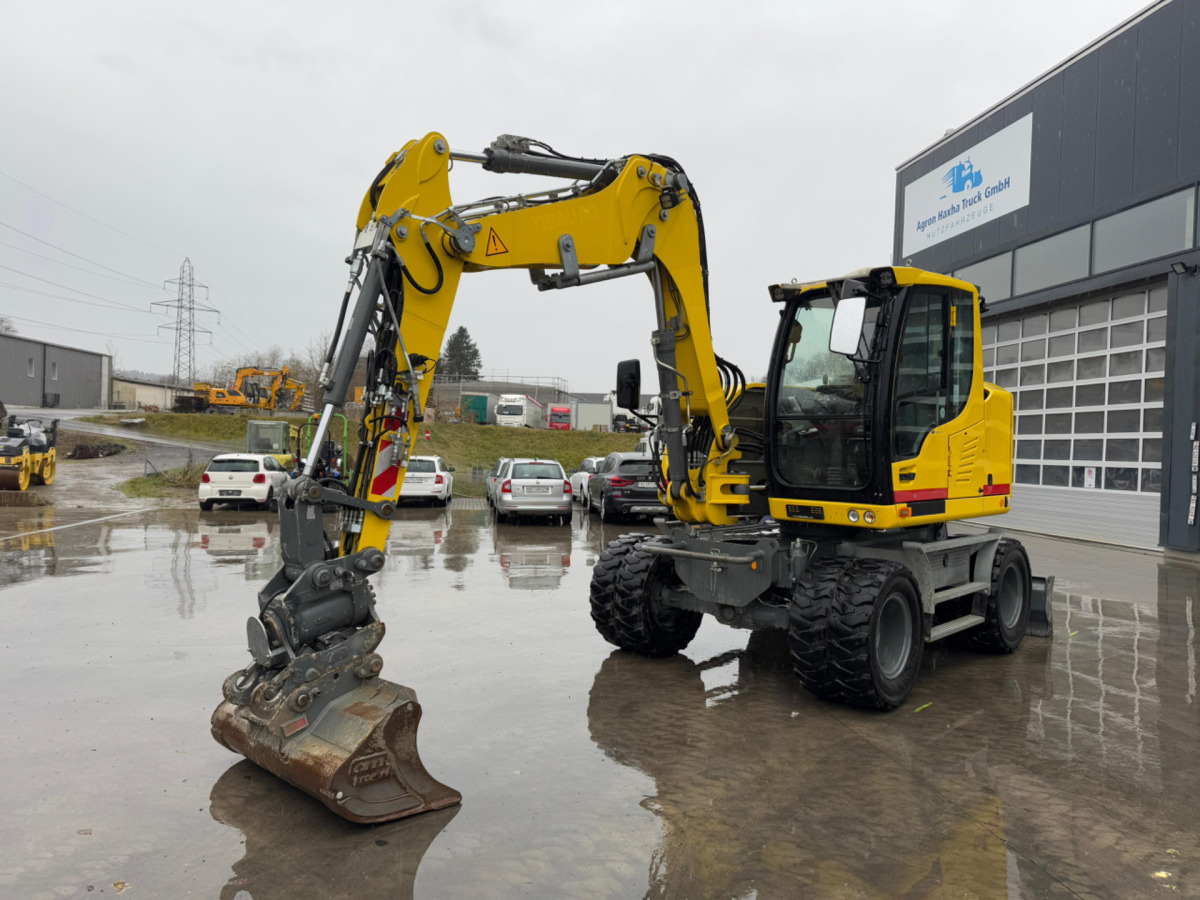LIEBHERR 910 Compact Litronic Powertilt - 휠 굴삭기 : 사진 1 LIEBHERR 910 Compact Litronic Powertilt - 휠 굴삭기 : 사진 1
