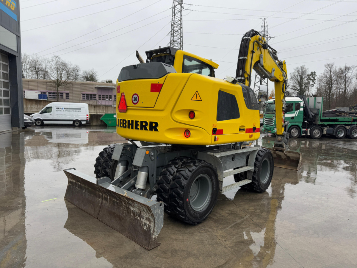 LIEBHERR 910 Compact Litronic Powertilt - 휠 굴삭기 : 사진 4 LIEBHERR 910 Compact Litronic Powertilt - 휠 굴삭기 : 사진 4