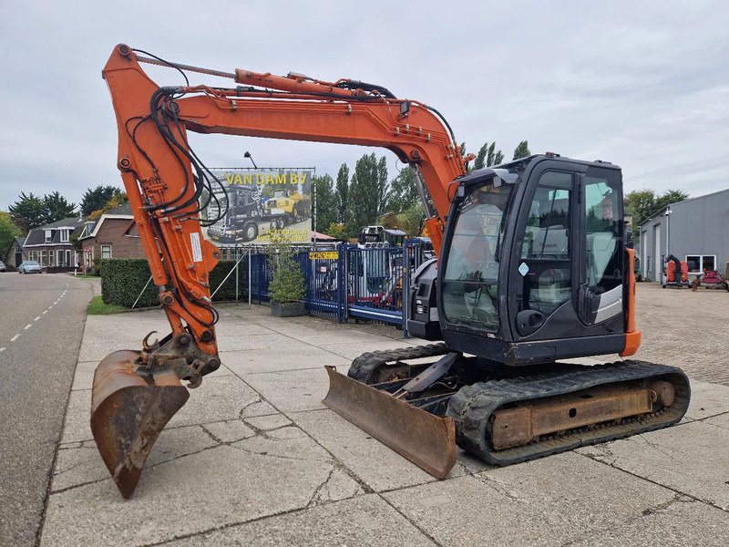 Hitachi ZX85US-5A - 미니 굴삭기 : 사진 1 Hitachi ZX85US-5A - 미니 굴삭기 : 사진 1