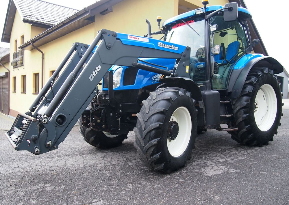 Ciągnik New Holland NH TS125A 6 cylindrów 2004 Ciągnik rolniczy New Holland TS125A - 장궤형 트랙터 : 사진 1 Ciągnik New Holland NH TS125A 6 cylindrów 2004 Ciągnik rolniczy New Holland TS125A - 장궤형 트랙터 : 사진 1
