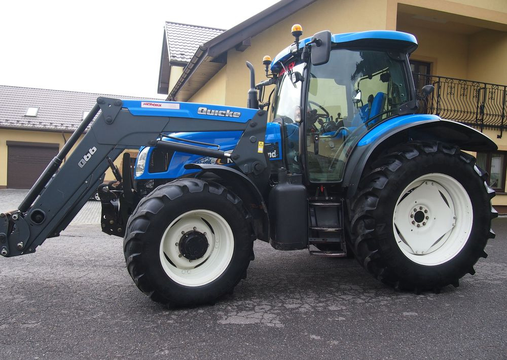 Ciągnik New Holland NH TS125A 6 cylindrów 2004 Ciągnik rolniczy New Holland TS125A - 장궤형 트랙터 : 사진 3 Ciągnik New Holland NH TS125A 6 cylindrów 2004 Ciągnik rolniczy New Holland TS125A - 장궤형 트랙터 : 사진 3