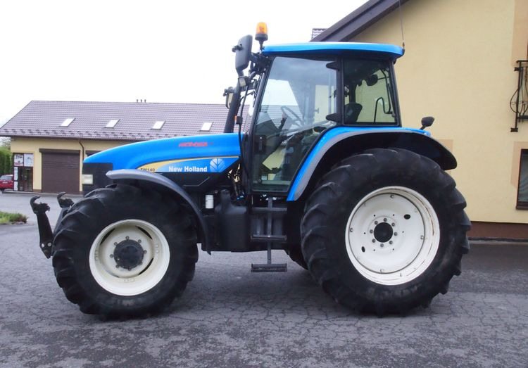 Ciągnik New Holland TM 140 2004 Przedni TUZ - 장궤형 트랙터 : 사진 5 Ciągnik New Holland TM 140 2004 Przedni TUZ - 장궤형 트랙터 : 사진 5