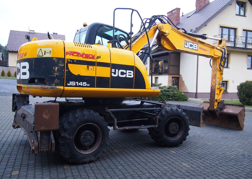 Koparka kołowa JCB JS145W 2011 Koparka JCB - 휠 굴삭기 : 사진 2 Koparka kołowa JCB JS145W 2011 Koparka JCB - 휠 굴삭기 : 사진 2