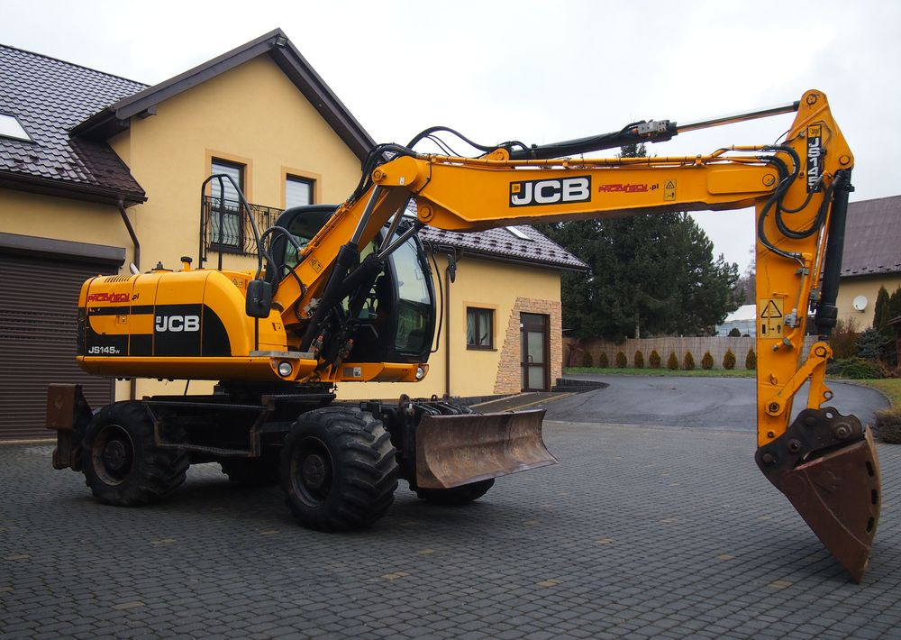 Koparka kołowa JCB JS145W 2011 Koparka JCB - 휠 굴삭기 : 사진 1 Koparka kołowa JCB JS145W 2011 Koparka JCB - 휠 굴삭기 : 사진 1
