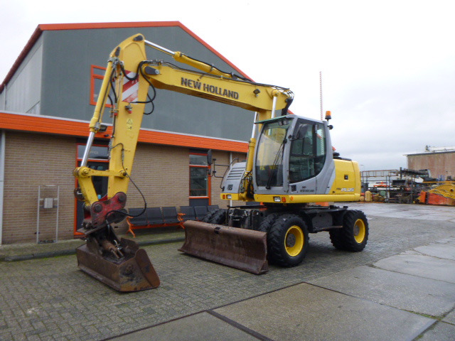 NEW HOLLAND MH PLUS - 휠 굴삭기 : 사진 1 NEW HOLLAND MH PLUS - 휠 굴삭기 : 사진 1