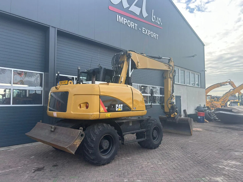 Caterpillar M313D - 휠 굴삭기 : 사진 4 Caterpillar M313D - 휠 굴삭기 : 사진 4