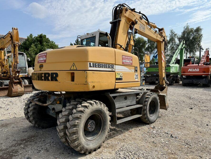 Liebherr A314 - 휠 굴삭기 : 사진 3 Liebherr A314 - 휠 굴삭기 : 사진 3