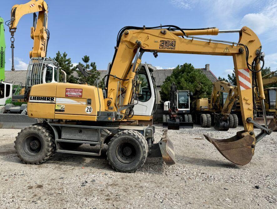 Liebherr A314 - 휠 굴삭기 : 사진 4 Liebherr A314 - 휠 굴삭기 : 사진 4