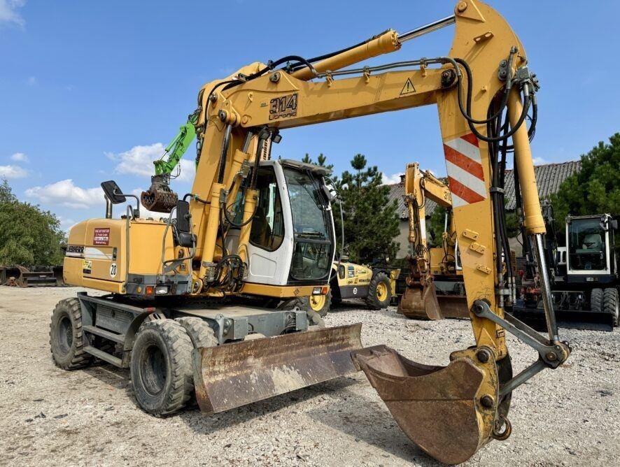 Liebherr A314 - 휠 굴삭기 : 사진 5 Liebherr A314 - 휠 굴삭기 : 사진 5