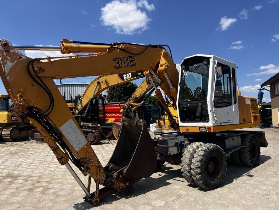 Liebherr A316  - 휠 굴삭기 : 사진 1 Liebherr A316  - 휠 굴삭기 : 사진 1