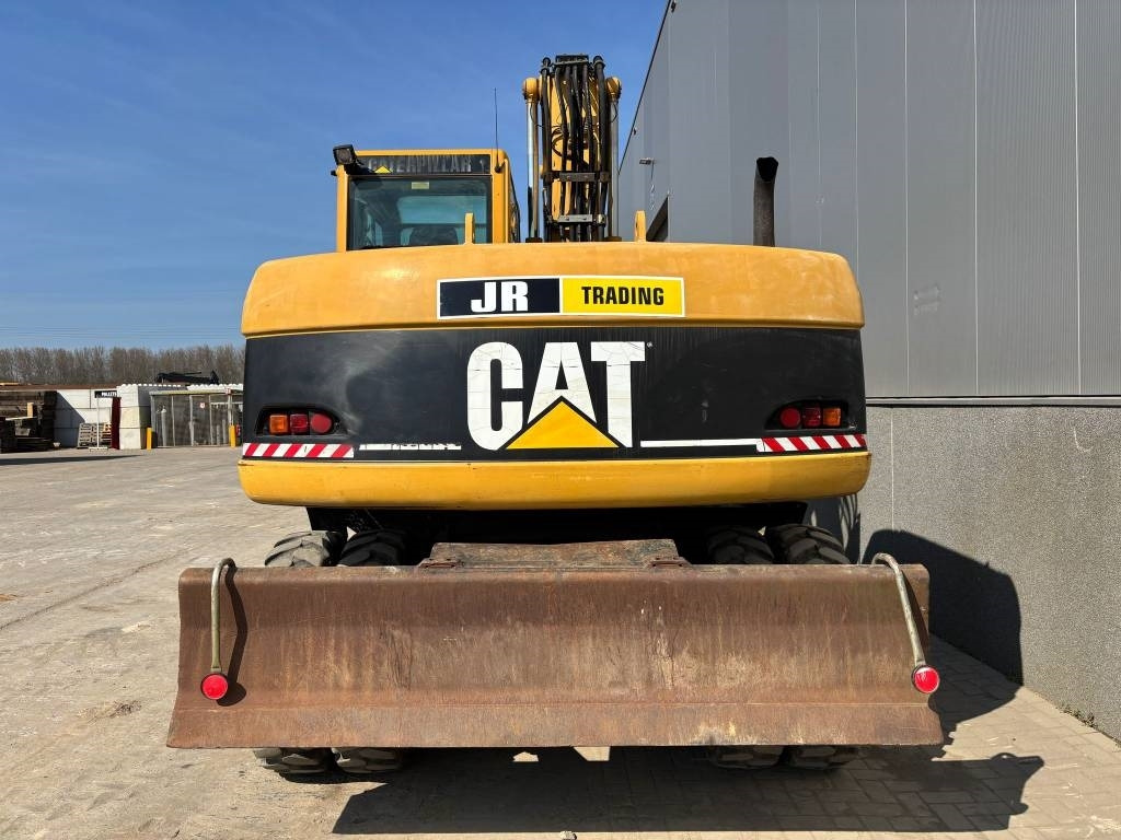 CAT M 313 C (Low verified hours) - 휠 굴삭기 : 사진 4 CAT M 313 C (Low verified hours) - 휠 굴삭기 : 사진 4