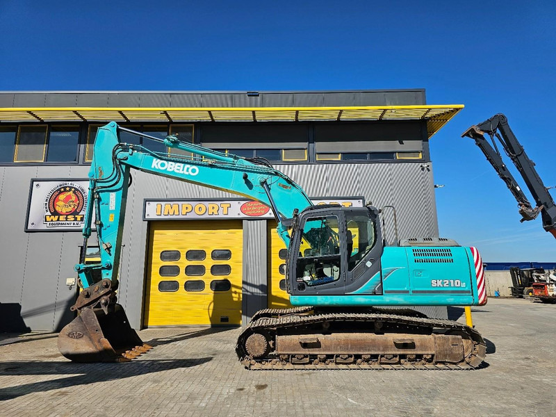Kobelco SK210LC-9 - 크롤러 굴삭기 : 사진 1 Kobelco SK210LC-9 - 크롤러 굴삭기 : 사진 1